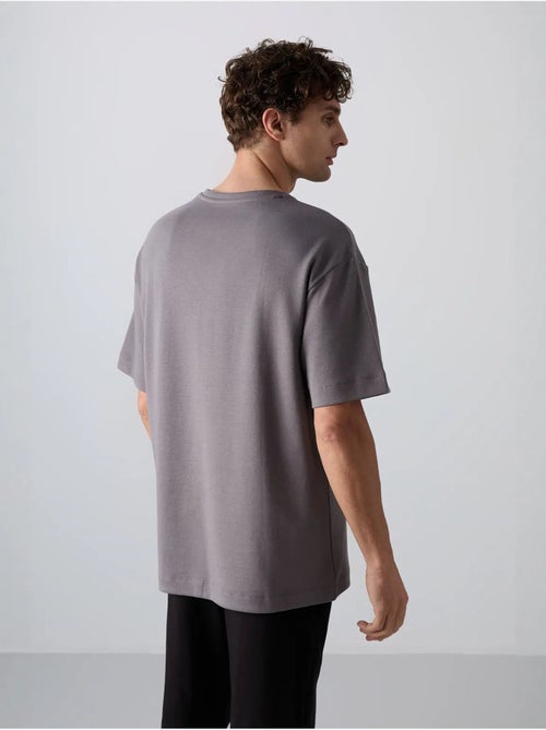 T-shirt oversize en mélange coton à col rond tommy - Kiabi T-shirt oversize en mélange coton à col rond tommy - Kiabi