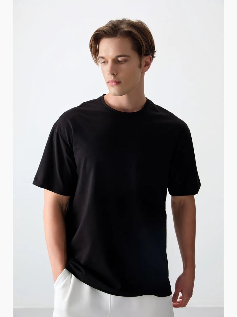T-shirt oversize en mélange de coton à col rond tommy Noir - Kiabi