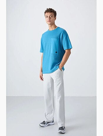 T-shirt oversize en mélange de coton avec poche et col rond tommy