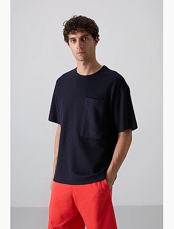 T-shirt oversize en mélange de coton avec poche et col rond tommy