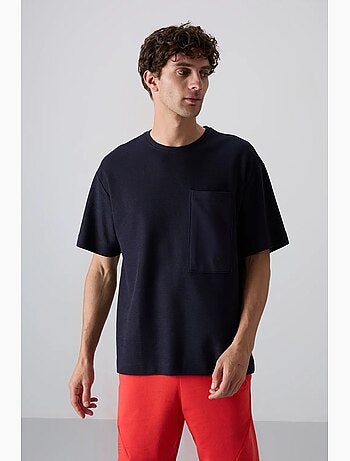 T-shirt oversize en mélange de coton avec poche et col rond tommy