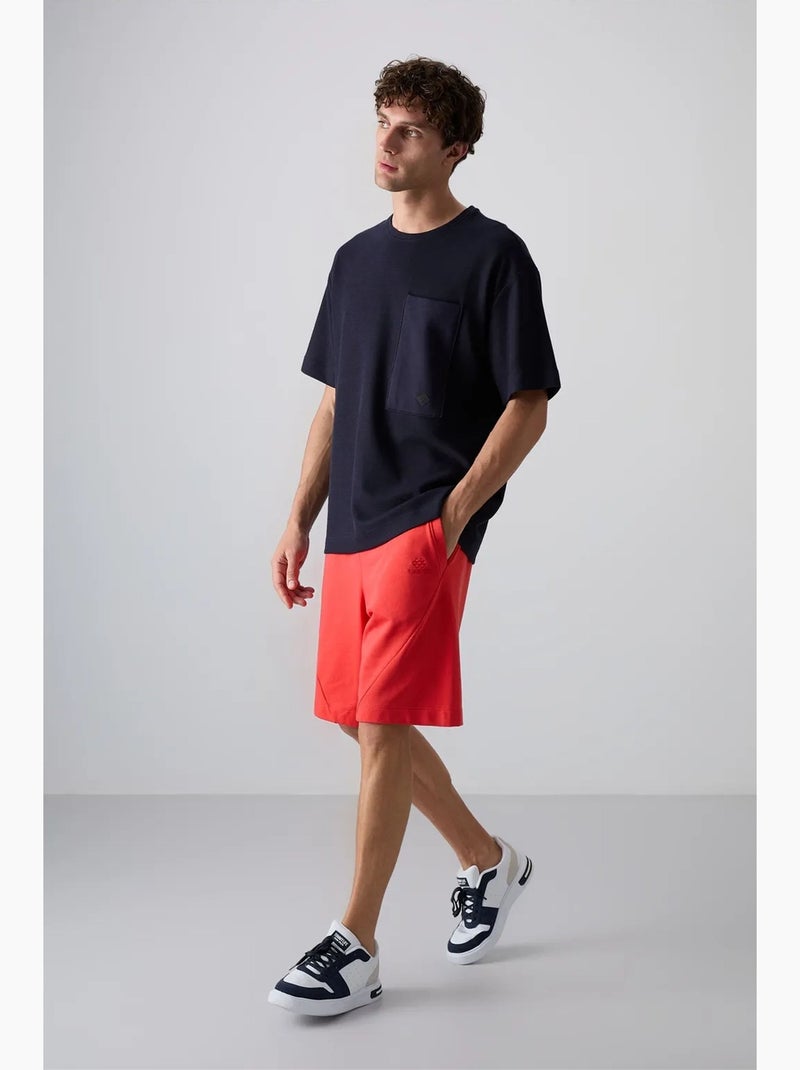 T-shirt oversize en mélange de coton avec poche et col rond tommy Bleu marine - Kiabi