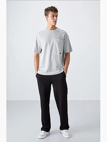 T-shirt oversize en mélange de coton avec poche et col rond tommy