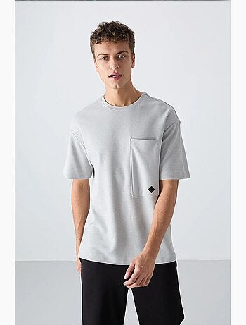 T-shirt oversize en mélange de coton avec poche et col rond tommy