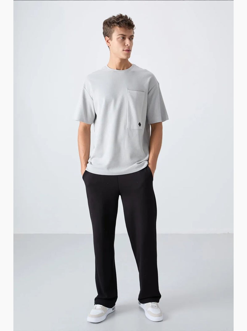 T-shirt oversize en mélange de coton avec poche et col rond tommy Gris clair - Kiabi