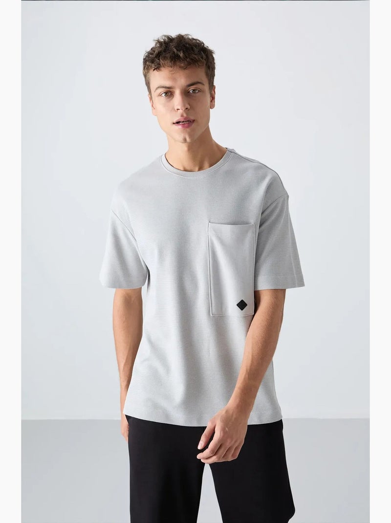 T-shirt oversize en mélange de coton avec poche et col rond tommy Gris clair - Kiabi