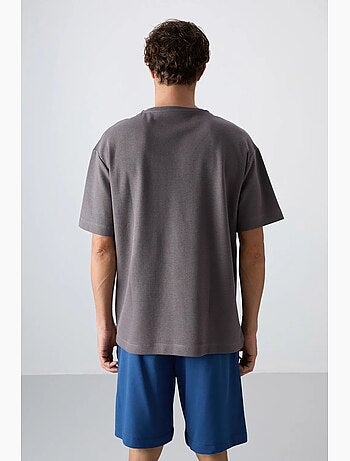 T-shirt oversize en mélange de coton avec poche et col rond tommy