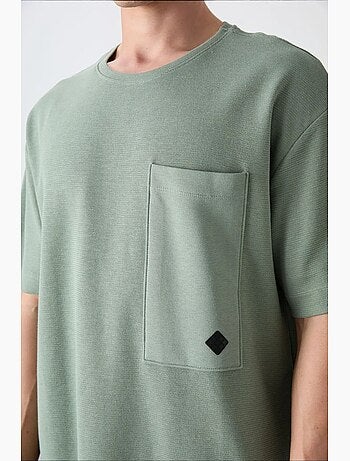 T-shirt oversize en mélange de coton avec poche et col rond tommy
