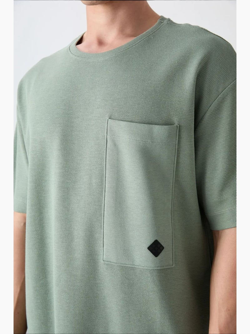 T-shirt oversize en mélange de coton avec poche et col rond tommy Vert menthe - Kiabi