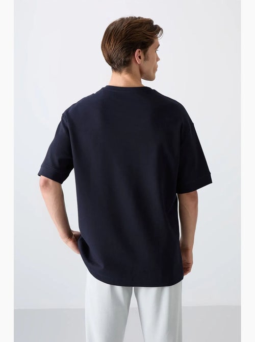 T-shirt oversize imprimé à col rond tommy - Kiabi T-shirt oversize imprimé à col rond tommy - Kiabi