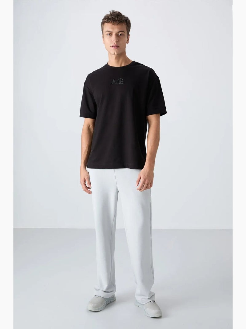 T-shirt oversize imprimé à col rond tommy Noir - Kiabi