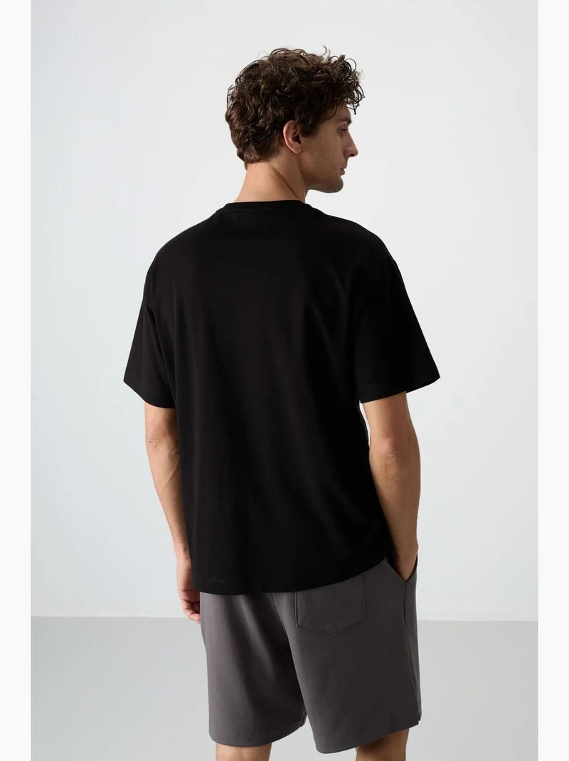 T-shirt oversize imprimé à col rond tommy Noir - Kiabi