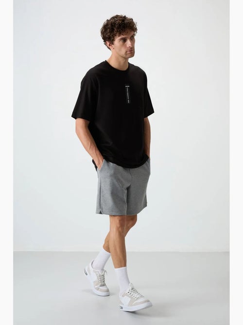 T-shirt oversize imprimé à col rond tommy - Kiabi T-shirt oversize imprimé à col rond tommy - Kiabi