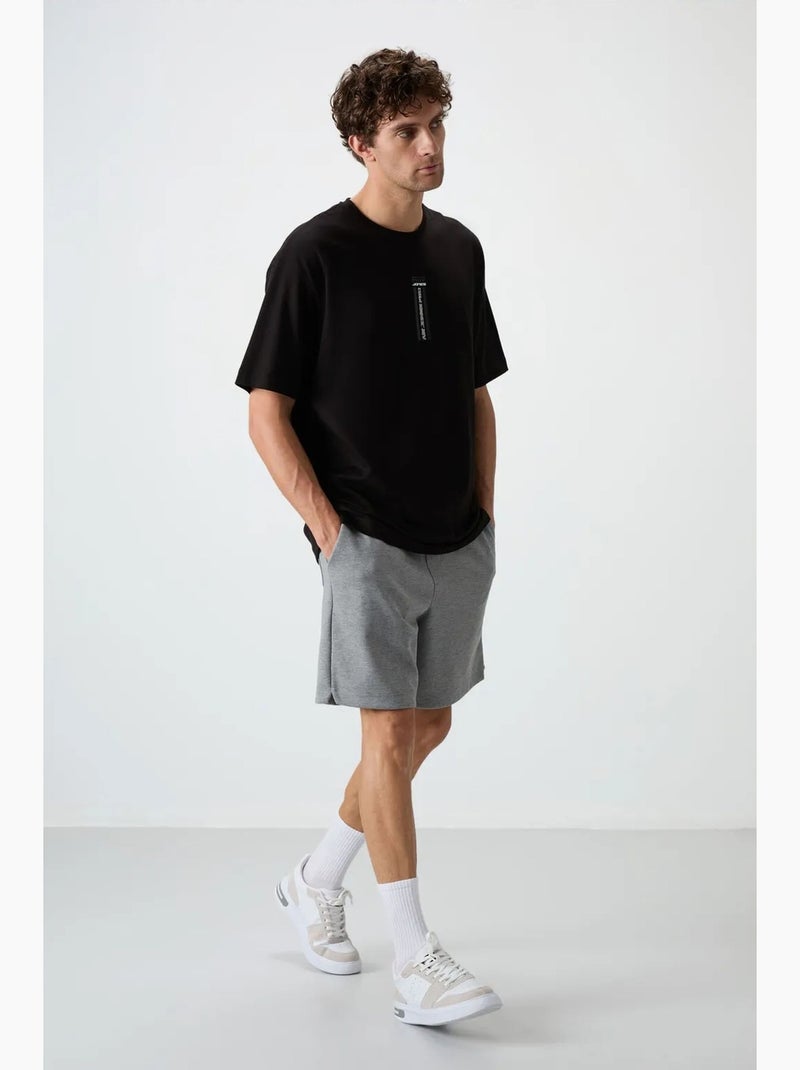 T-shirt oversize imprimé à col rond tommy Noir - Kiabi