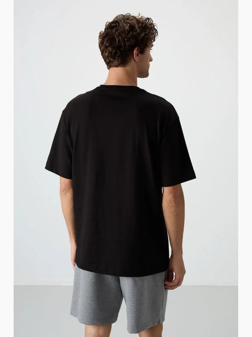 T-shirt oversize imprimé à col rond tommy - Kiabi T-shirt oversize imprimé à col rond tommy - Kiabi