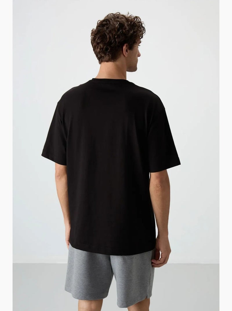 T-shirt oversize imprimé à col rond tommy Noir - Kiabi