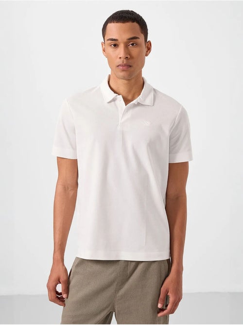 T-shirt polo homme en coton et élasthanne tommy - Kiabi T-shirt polo homme en coton et élasthanne tommy - Kiabi