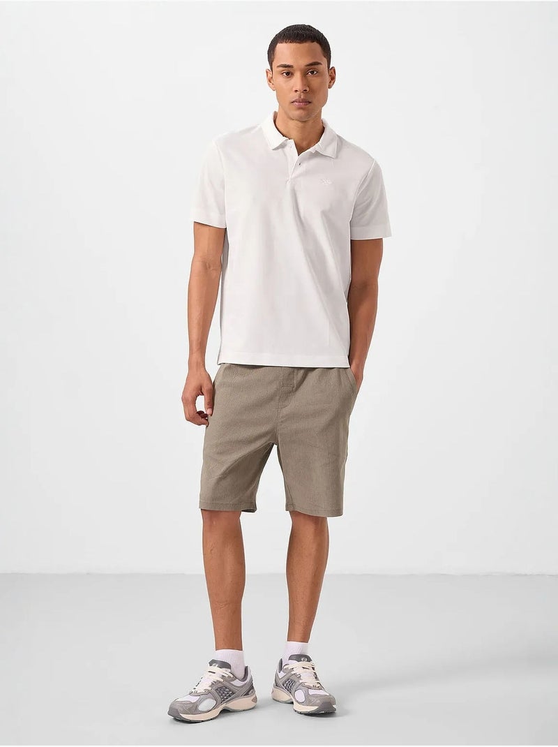 T-shirt polo homme en coton et élasthanne tommy Blanc cassé - Kiabi