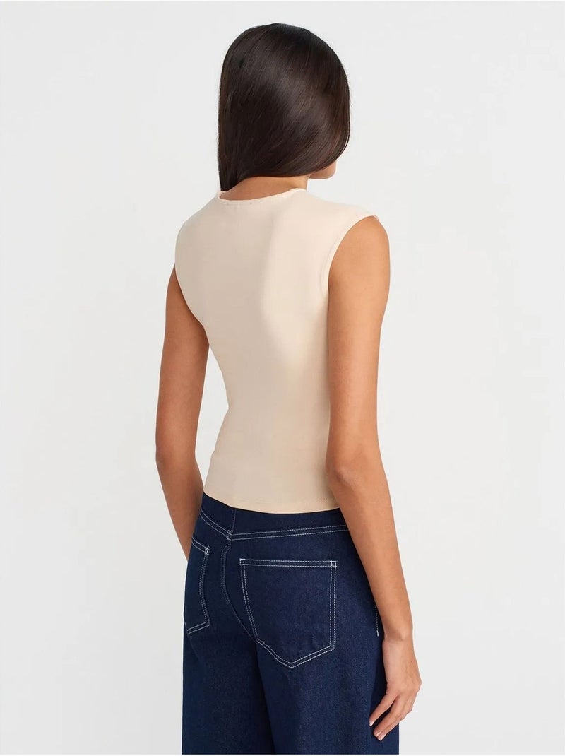 T-shirt sans manches côtelé à col rond et coupe ajustée Beige clair - Kiabi