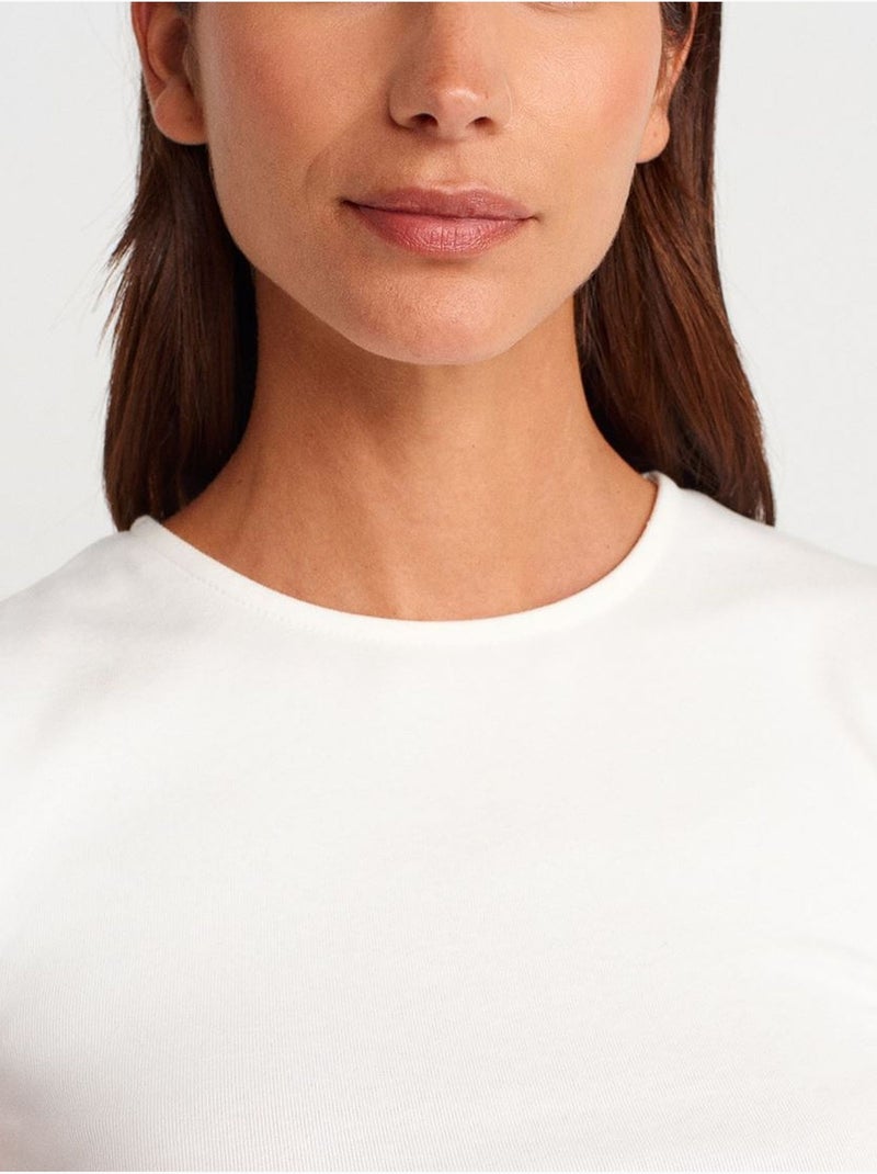 T-shirt sans manches côtelé à col rond et coupe ajustée dilvin Blanc cassé - Kiabi
