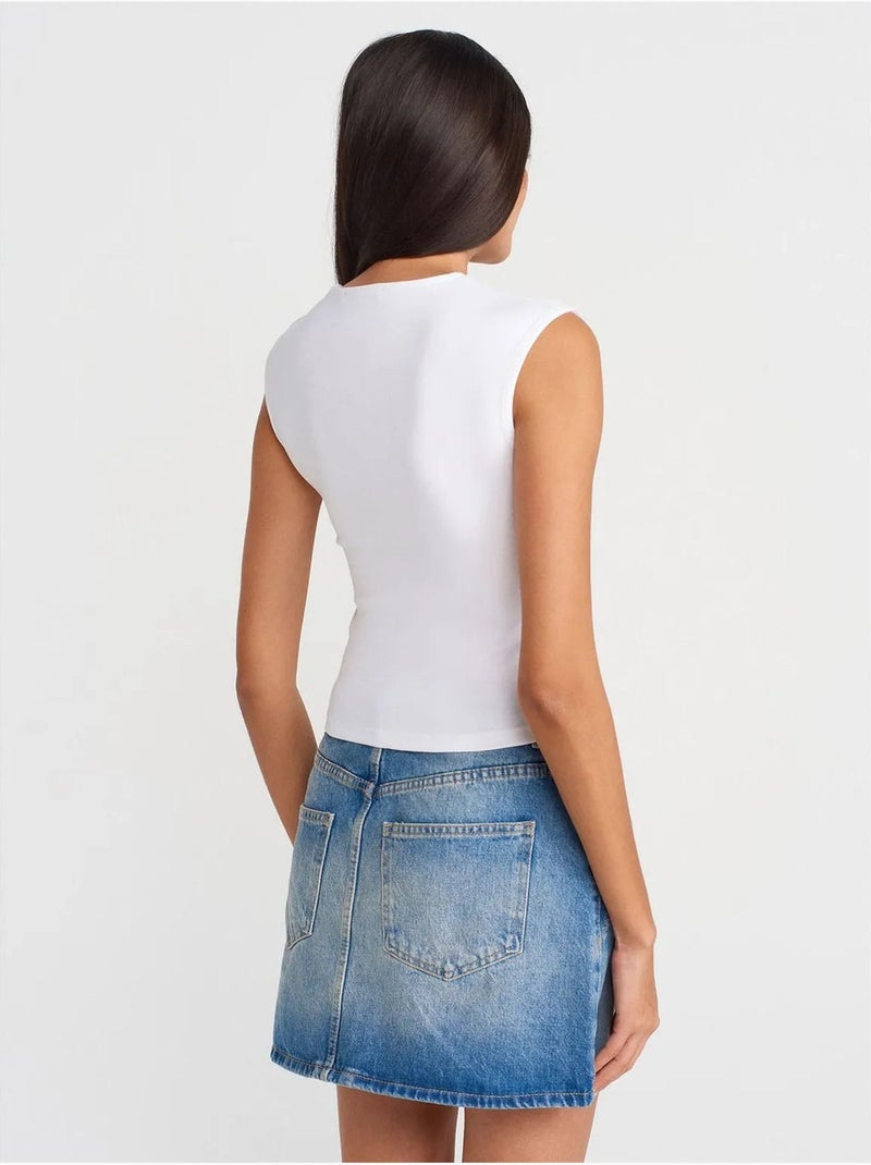 T-shirt sans manches côtelé à col rond et coupe ajustée dilvin Blanc - Kiabi
