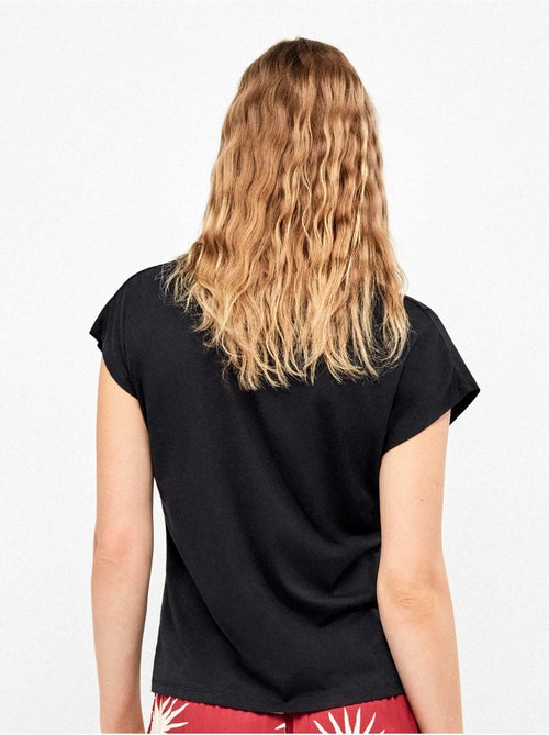 T-shirt sans manches en couleur bleue - Kiabi T-shirt sans manches en couleur bleue - Kiabi