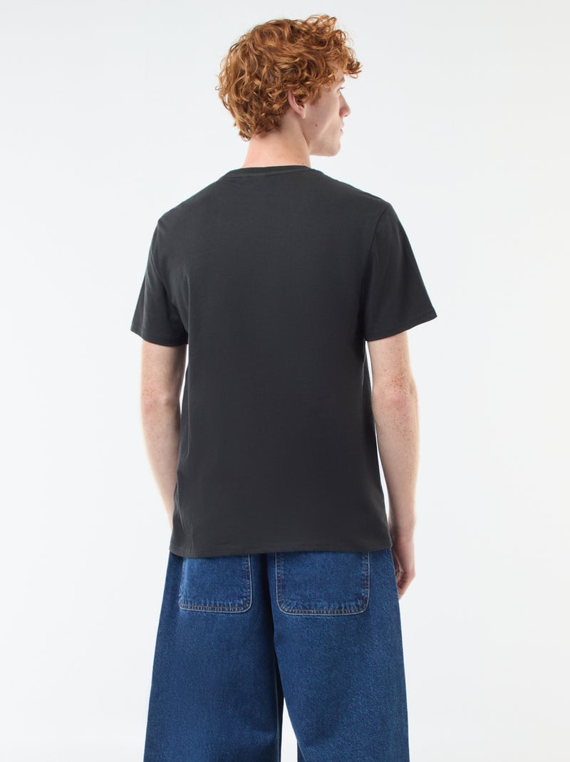 T-shirt 'Sun city' 'Stranger things' 'Netflix' en coton Noir - Kiabi