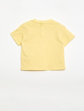 T-shirt uni avec fleurs fantaisies au col