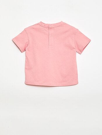 T-shirt uni avec fleurs fantaisies au col