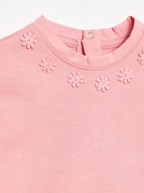 T-shirt uni avec fleurs fantaisies au col - Kiabi