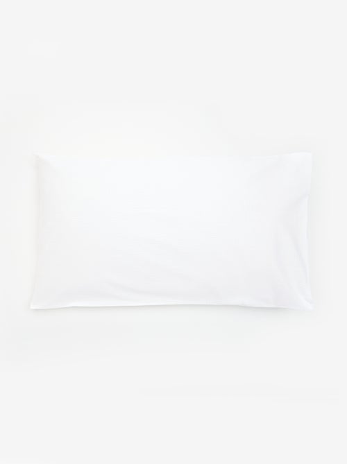 Taie d'oreiller unie - 50 x 70 cm en seersucker - Kiabi Taie d'oreiller unie - 50 x 70 cm en seersucker - Kiabi