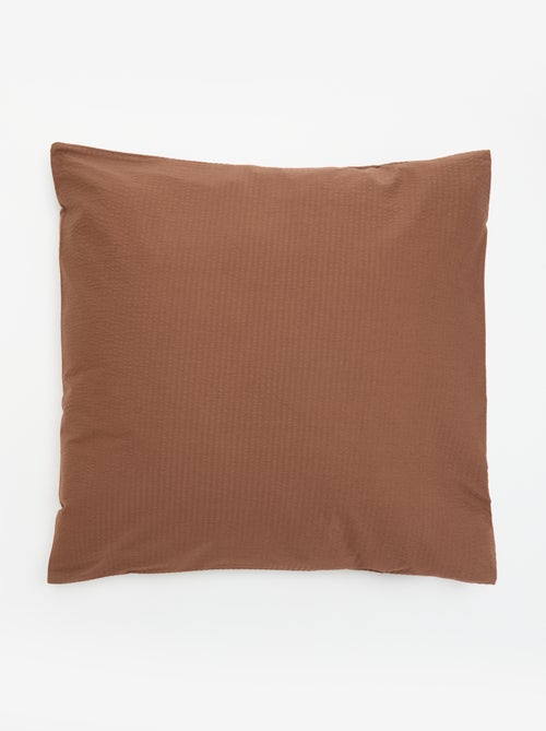 Taie d'oreiller unie - 63 x 63 cm en seersucker - Kiabi Taie d'oreiller unie - 63 x 63 cm en seersucker - Kiabi