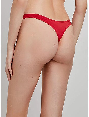 Tanga bikini en tissu uni.