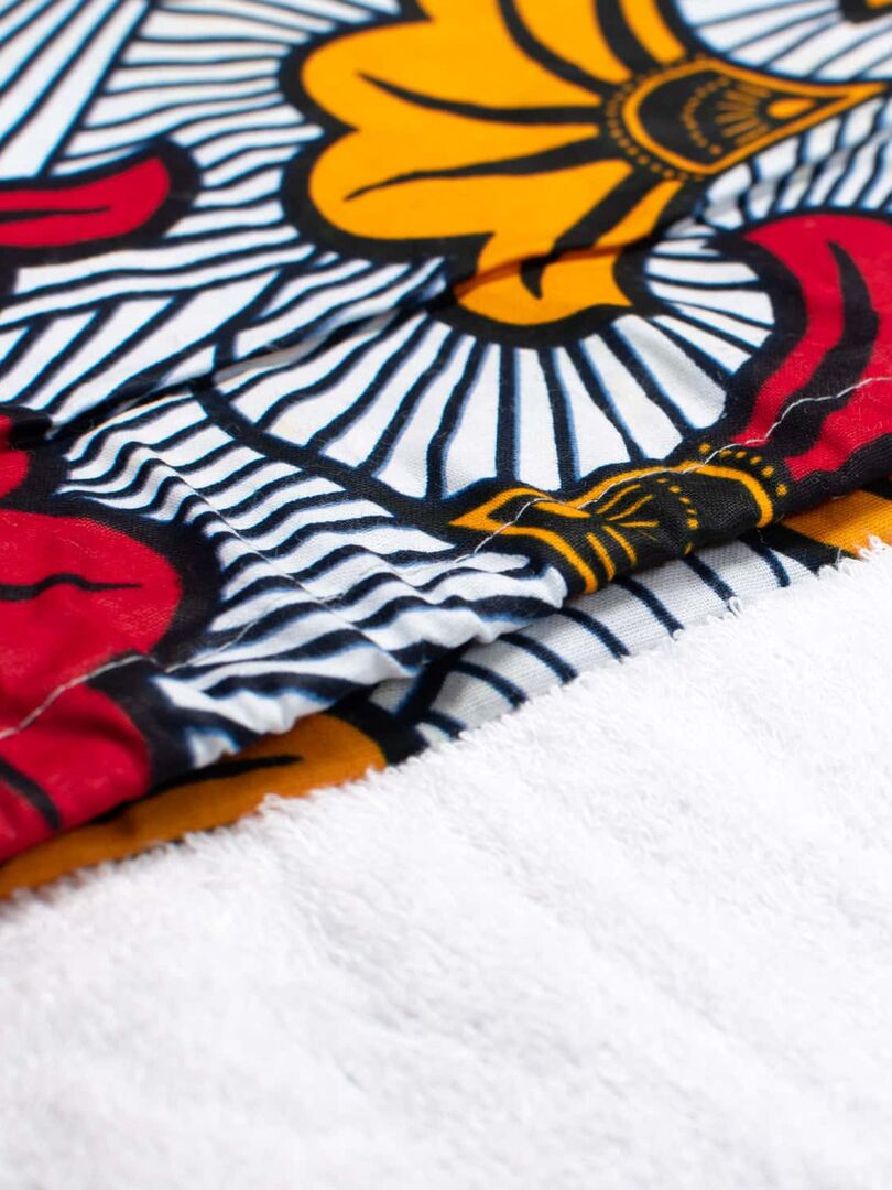 Tapis à langer nomade, Wax Fleurs de mariage Rouge - Kiabi
