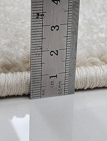 Tapis chambre tissé motif géométrique DOURTA