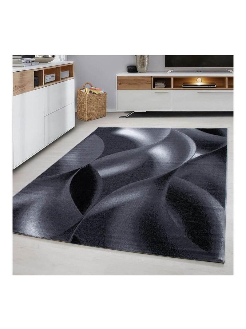 Tapis courbe moderne à courtes mèches Zilfa Noir - Kiabi
