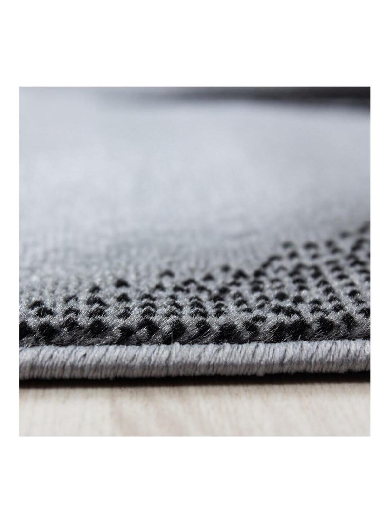 Tapis courbe moderne à courtes mèches Zilfa Noir - Kiabi