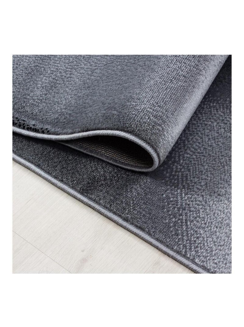 Tapis courbe moderne à courtes mèches Zilfa Noir - Kiabi