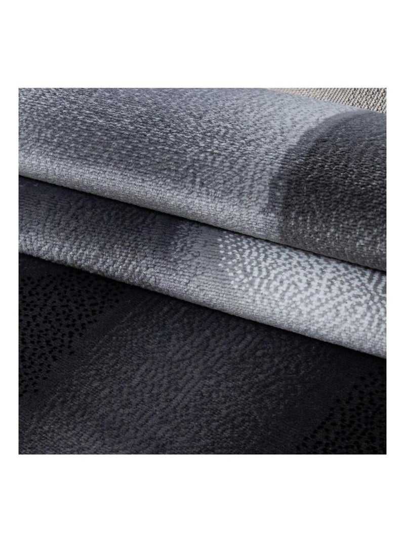 Tapis courbe moderne à courtes mèches Zilfa Noir - Kiabi