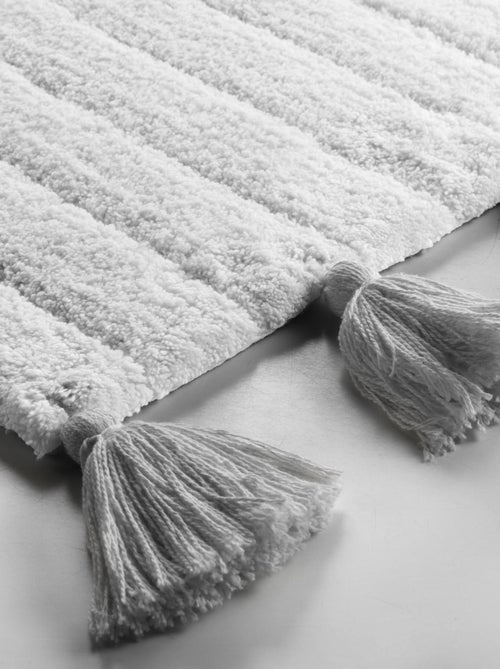 Tapis de bain uni et à pompons - Kiabi