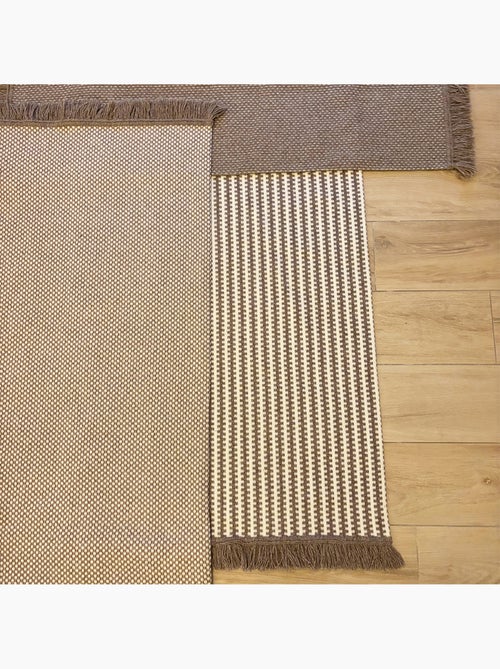 Tapis en laine et coton à motif rayé graphique - Kiabi Tapis en laine et coton à motif rayé graphique - Kiabi