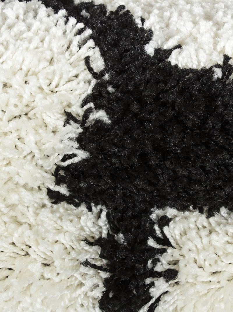 Tapis enfant tissé SHAGGY FOOT Noir - Kiabi