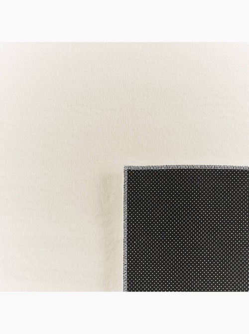 Tapis intérieur uni blanc oscaria - Kiabi Tapis intérieur uni blanc oscaria - Kiabi