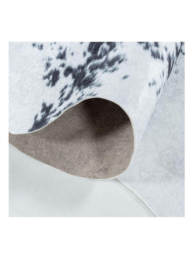 Tapis lavable en machine noir imitation peau de bête Malu Noir - Kiabi