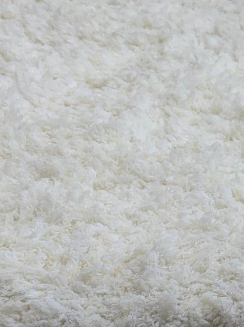 Tapis longs poils shaggy fait à la main motif uni SUPERDOUX - Kiabi