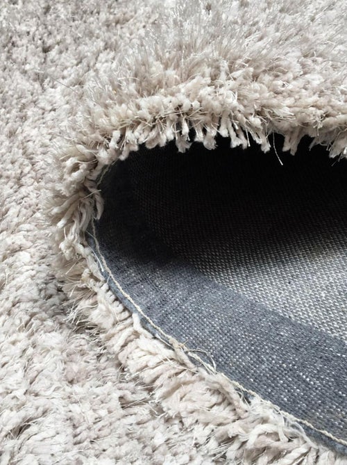 Tapis longs poils shaggy fait main motif uni LUXE - Kiabi