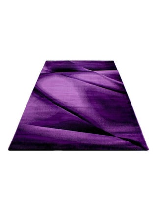 Tapis moderne effet courbe à courtes mèches Kyzac