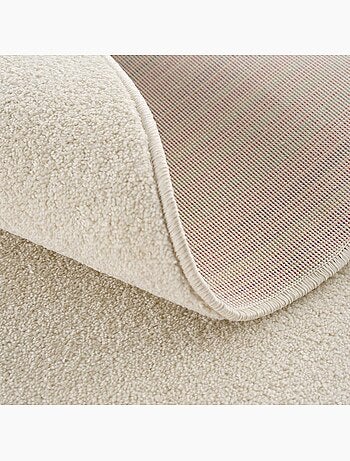 Tapis rond tissé motif uni NOSSA