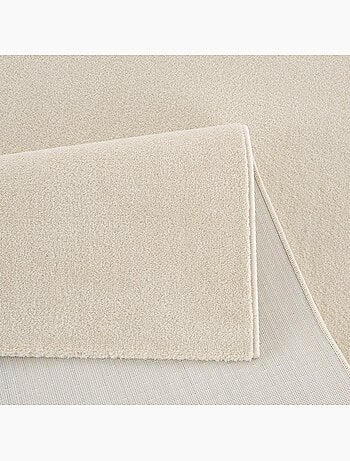 Tapis rond tissé motif uni NOSSA