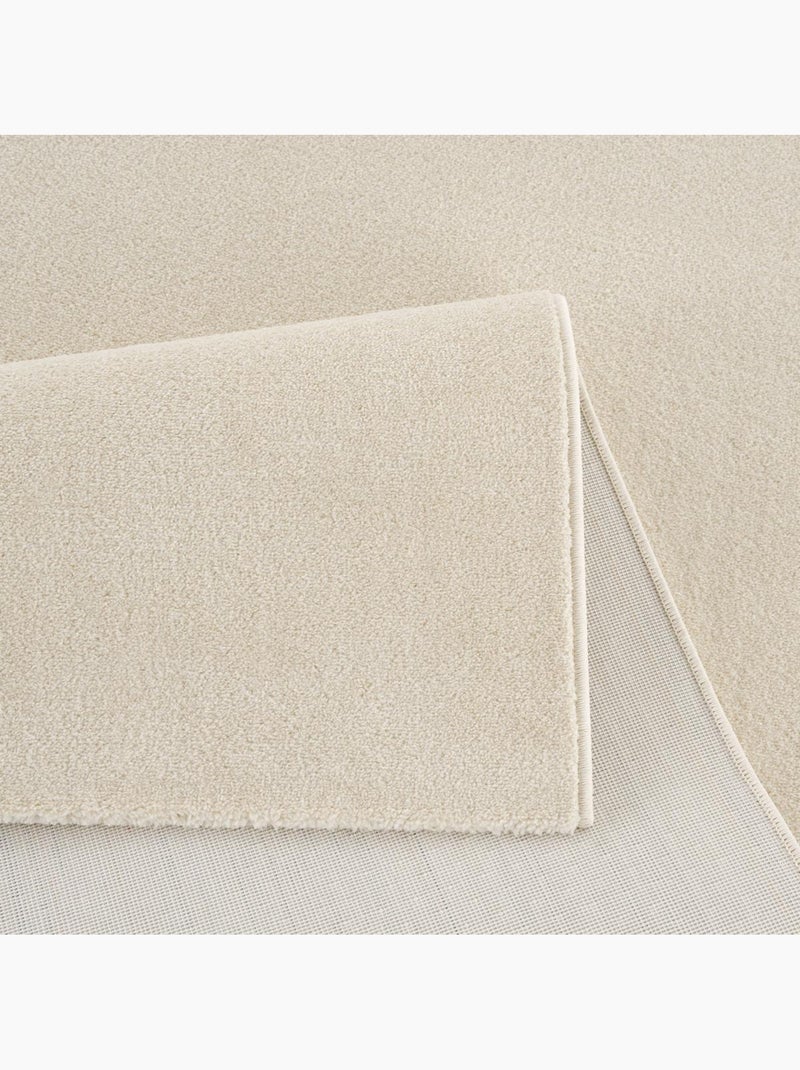 Tapis rond tissé motif uni NOSSA Ecru - Kiabi